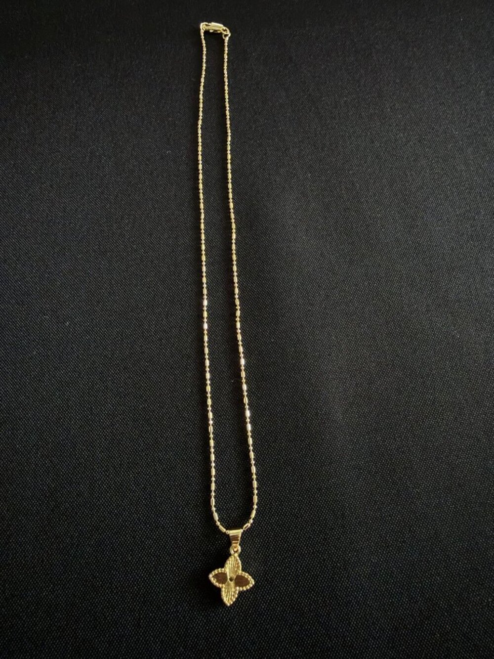 Gold-Tone Four-Petal Flower Pendant Necklace โ Bead Bar Chain